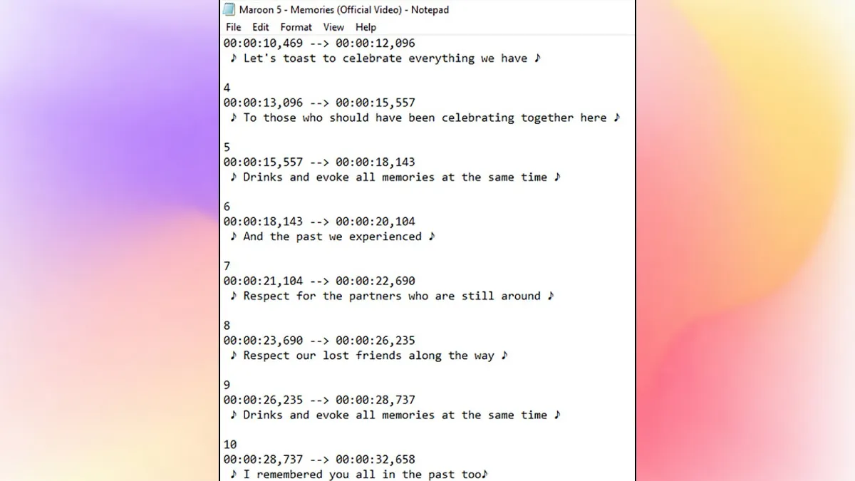 Nội dung file phụ đề hiển thị trong Notepad với các mốc thời gian, kết quả của quá trình áp dụng cách đẻ tải video trên YouTube và phụ đề.