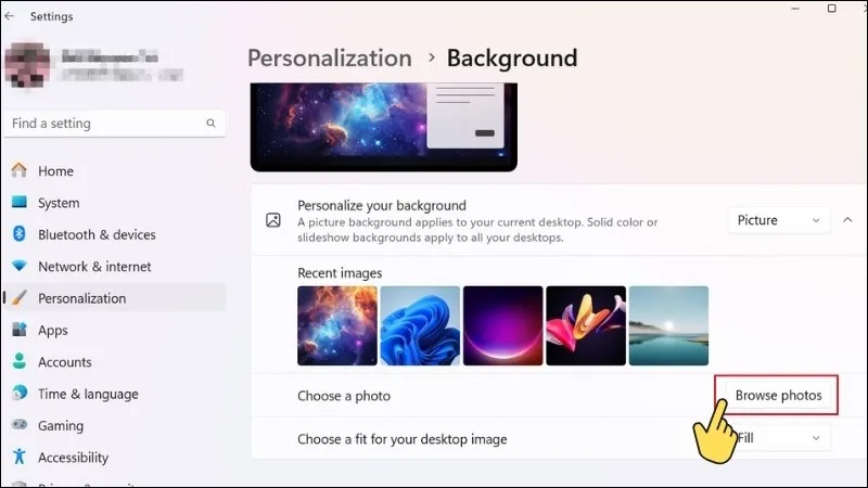 Chọn Browse Photos để tìm kiếm hình ảnh mới cho cách cài đặt màn hình nền máy tính Win 11
